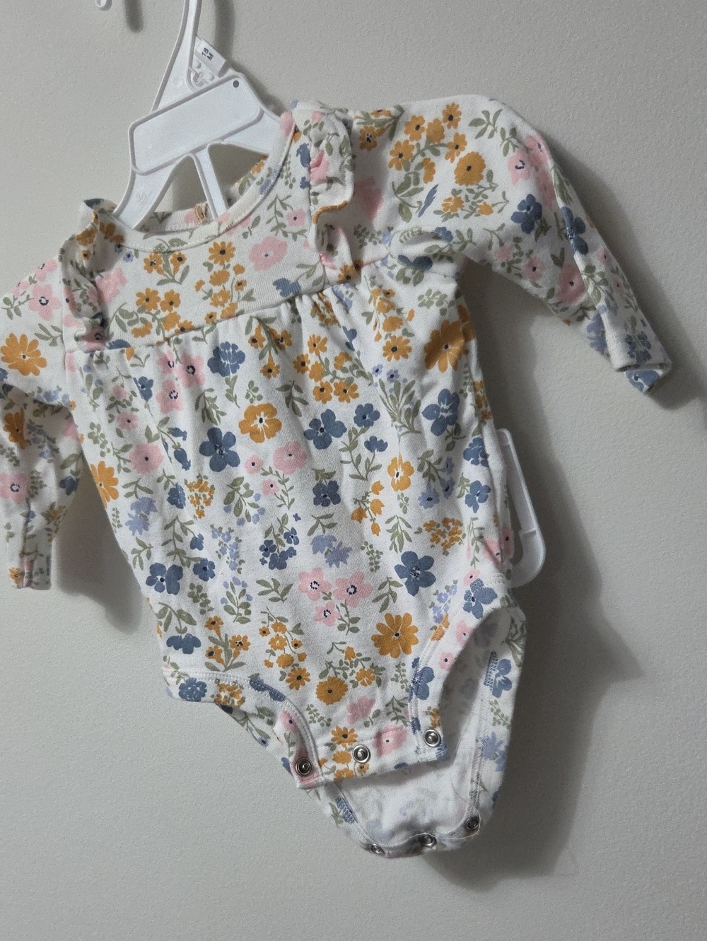 Floral Long-Sleeve Baby One-Piece in White with Yellow & Blue Flowers